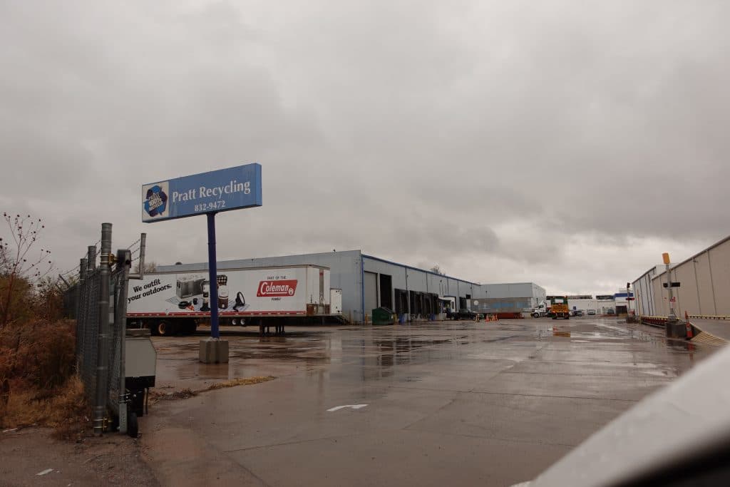 A large industrial warehouse in Wichita, KS, featuring professionally painted exteriors. The fresh paint enhances durability and weather resistance, ensuring long-lasting protection for commercial properties.