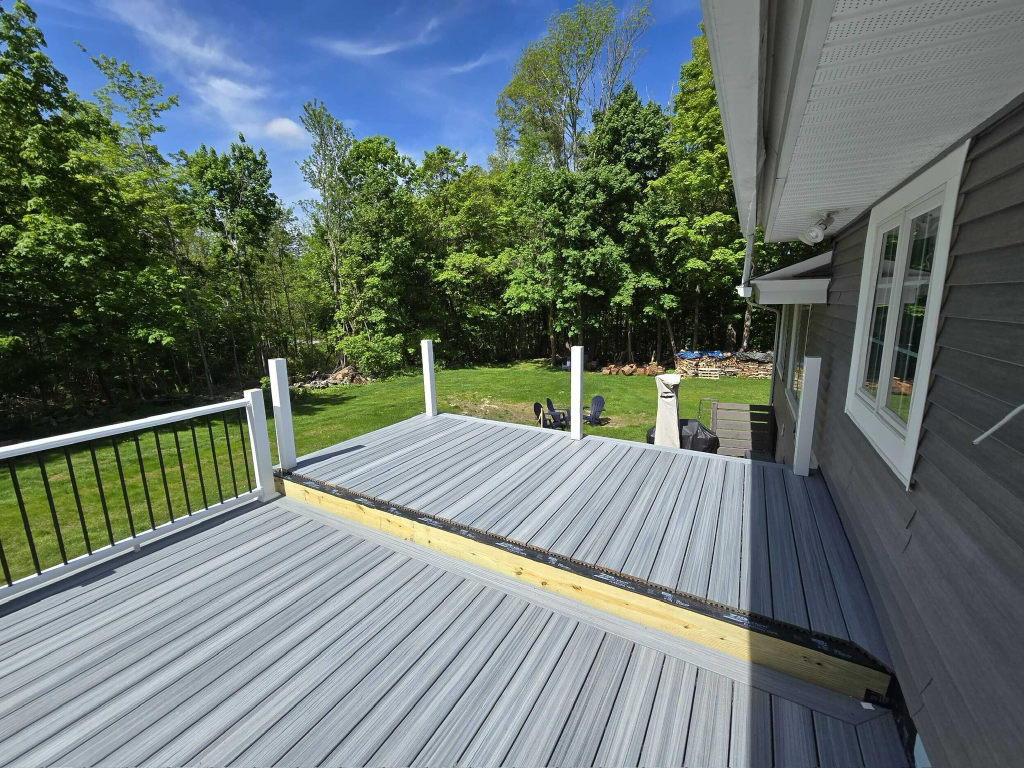 Close-up of Trex decking and modern black railings